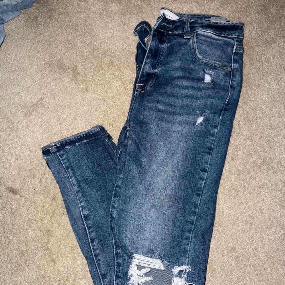 Blue Skinny Distressed Jeans with Ripped Details